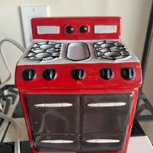 Stove looking candle burner